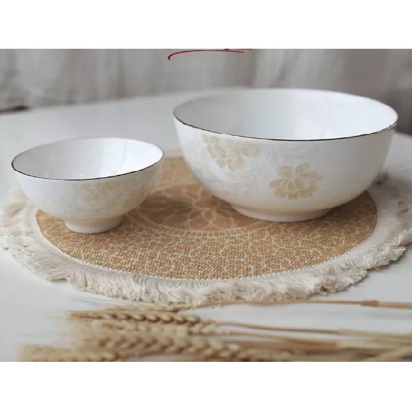 White ceramic crockery bowl used to store rice and salad, durable material, compact and convenient design