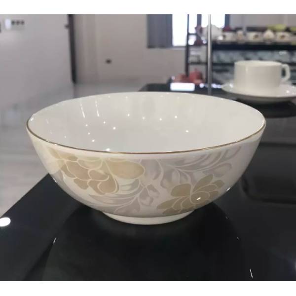 White ceramic crockery bowl used to store rice and salad, durable material, compact and convenient design